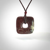 Hand carved Red Jasper Stone contemporary drop pendant. Carved by NZ Pacific in Jasper Stone. This is a modern drop pendant made from natural materials.